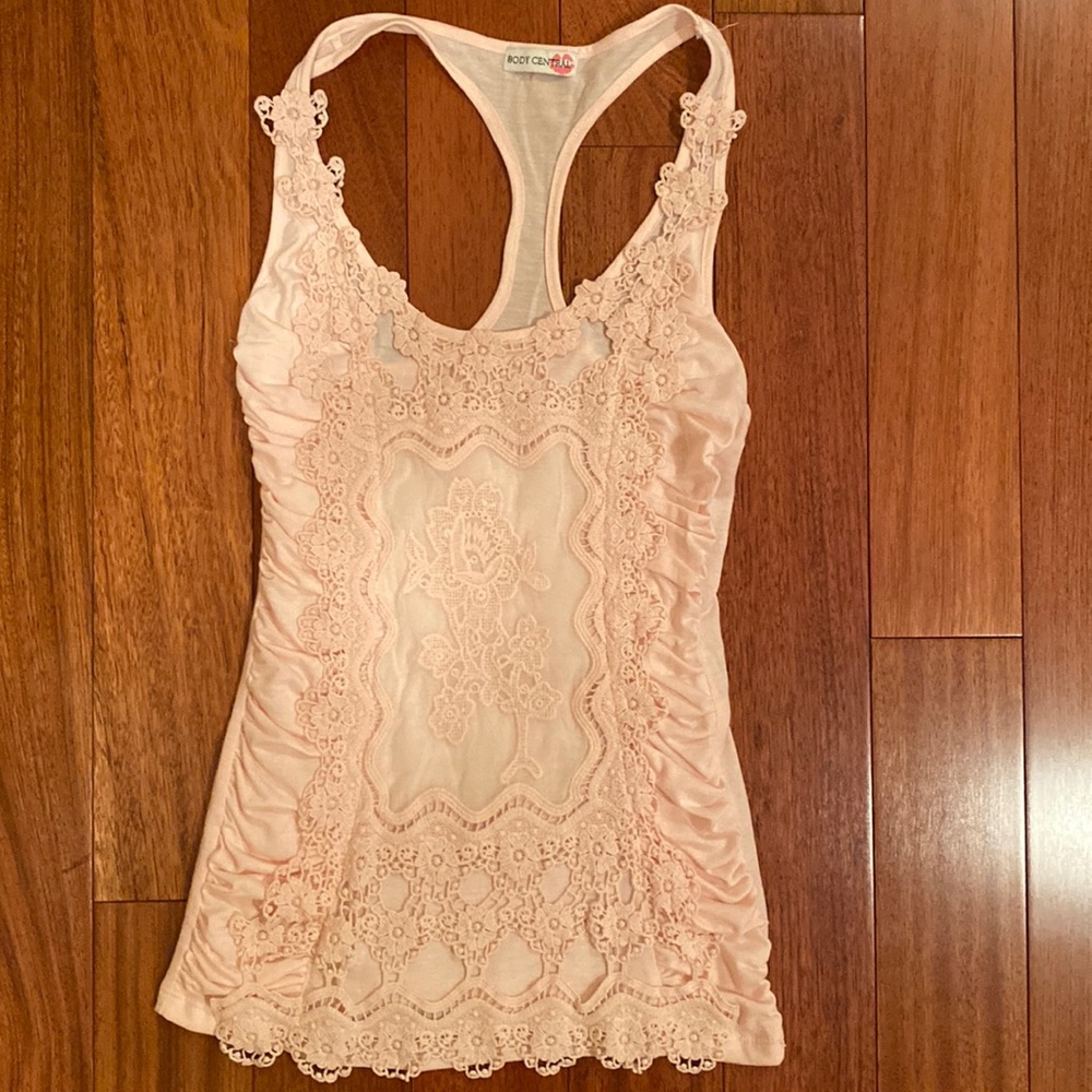 Pale pink tank top with crochet detailing